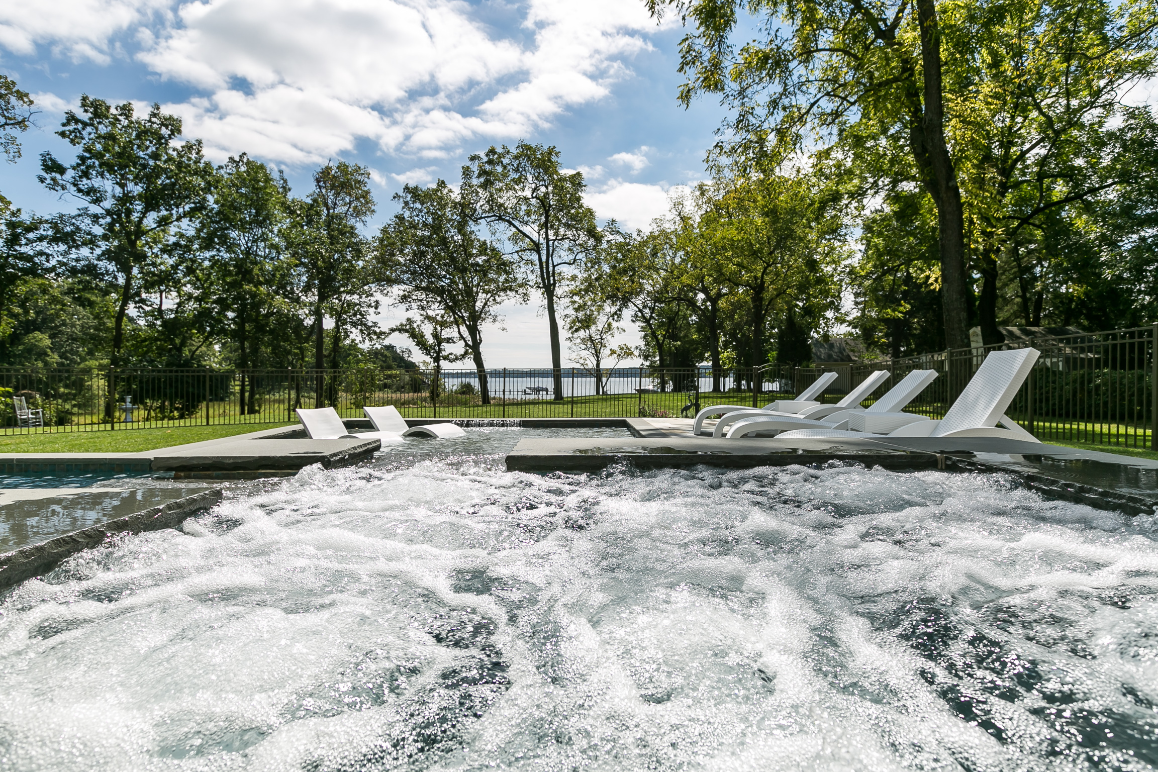 custom backyard pool water jets